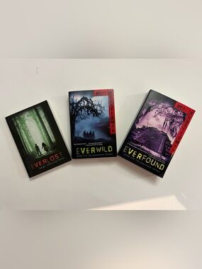 The Skinjacker Trilogy by Neal Shusterman. Volumes 1-3 of the series